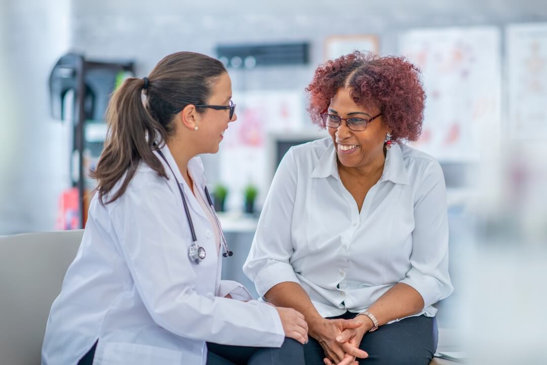 Doctor and Woman Smiling Image